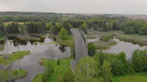 Aerial view of the unique moon-shaped Kirkilai Observation Tower and karst lakes Stock Footage 321756536