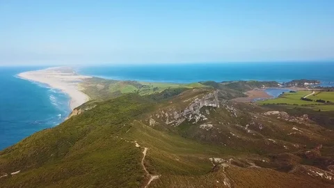 Aerial view of the unique sand spit of Farewell Spit in the Golden Bay Stock Footage 96253703