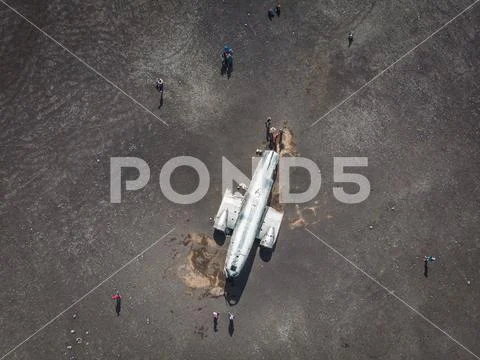 Aerial view of United States Navy DC plane wreck on the black be Stock Photos