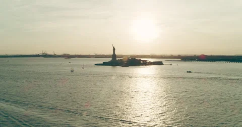 Aerial view of the Upper Bay and the Statue of Liberty in the distance, New York Stock Footage 199456434