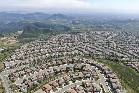 Aerial view of upper middle class neighborhood with big villas around Double Stock Photos