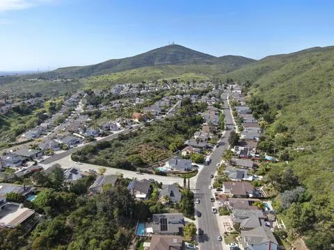 Aerial view of upper middle class neighborhood with residential house and Stock Photos
