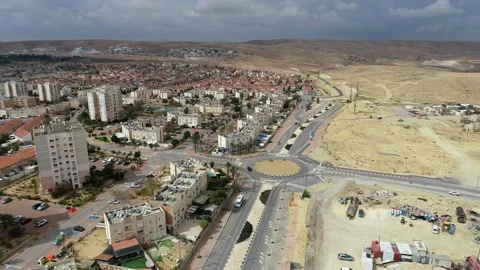 Aerial view of urban development in arid landscape Stock Footage 341616991