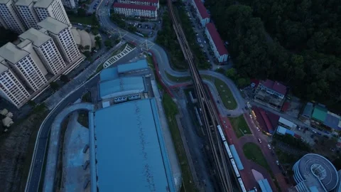 Aerial View of Urban Development with Roads and Green Spaces Stock Footage 312143997