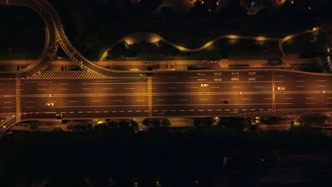 Aerial view of urban freeway interchange at night in Hangzhou city with car Stock Footage 314604757