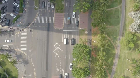 Aerial View of Urban Intersection Traffic and Green Space in Haikou, Hainan, Chi Stock Footage 341703396
