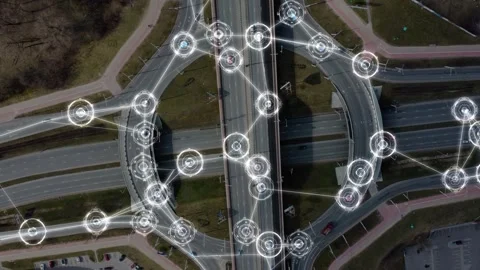 Aerial view of an urban multi-level intersection with many autonomous cars Stock Footage 329772016