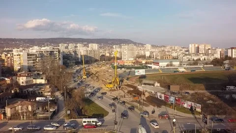 Aerial view of urban road construction and city traffic Stock Footage 346410313