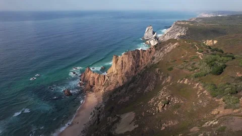 Aerial view of Ursa Beach from a hiking trail near Cabo da Roca, Portugal Stock Footage 211367010