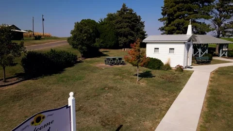 Aerial view of the U.S. Center Chapel and picnic shelter among trees Stock-Footage 345532863