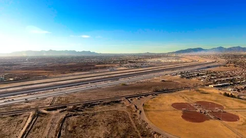 Aerial view of US-Mexican border area over El Paso, TX and Ciudad Juarez Stock Footage 102458618