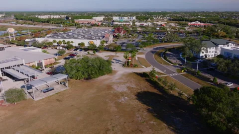 Aerial view vacant land development Palm Bay Florida winter ProRes 422HQ Stockbeeldmateriaal 335937264