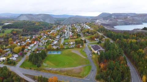 Aerial view of Val des Sources, formerly Asbestos, showing Jeffrey Mine and Stock Footage 303970893