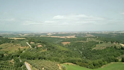 Aerial view of the Val D'Orcia during a beautiful sunrise. 4k Stock Footage 271733572