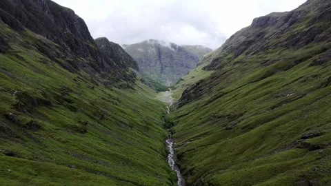 Aerial view of the valley of Bidean nam Bian and the Three Sisters, Scotland Stock Footage 337202170