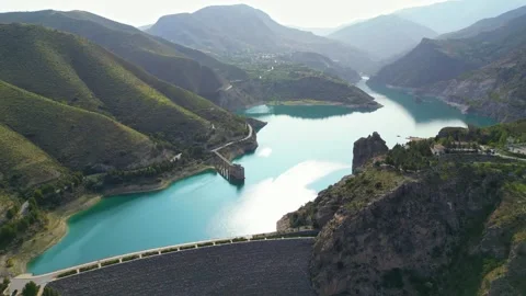 Aerial view of the valley with dam Stock Footage 267982539