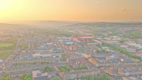 Aerial view of Valley Parade Stadium in Bradford, West Yorkshire at sunset Stock Footage 337637105