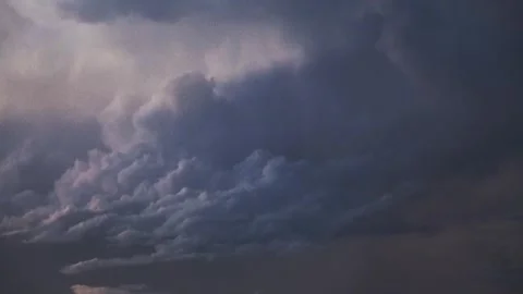 An aerial view of a vast storm cloud above the ocean. Stock Footage 317272304