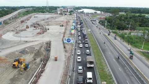 Aerial view of the vehicles are on queue the highway of mawa express way Stock Footage 247696040