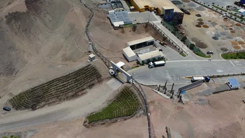 Aerial view of vehicles entering a border control checkpoint Stock Footage 337788893