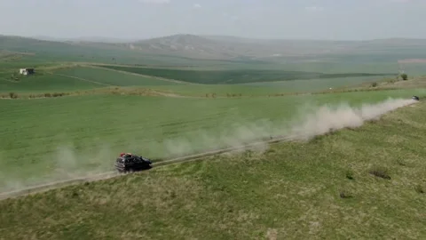 Aerial view, vehicles going up the hill with surreal landscape in Vashlovani 库存影片 238477702