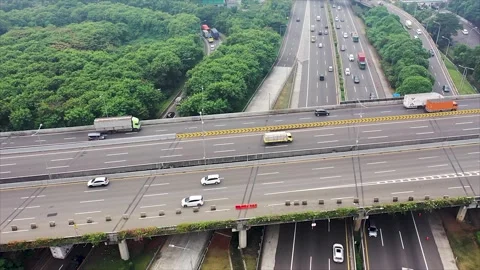 Aerial view of vehicles passing through underpass road near Tanah Abang market Stock Footage 204089021
