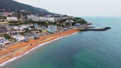 Aerial view of Ventnor beach, harbour and coastal town, Isle of Wight Stock Footage 337030439