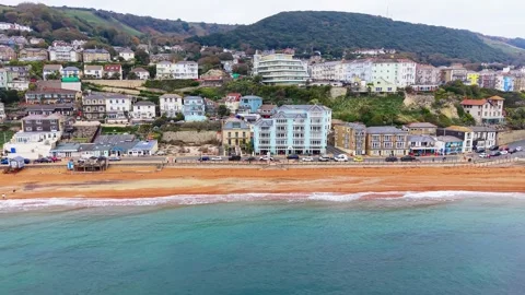 Aerial view of Ventnor beach, harbour and coastal town, Isle of Wight Stock Footage 337030874