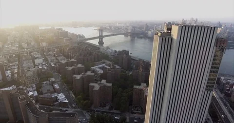 Aerial view of the Verizon Building to reveal the Manhattan and Brooklyn Bridges Stock Footage
