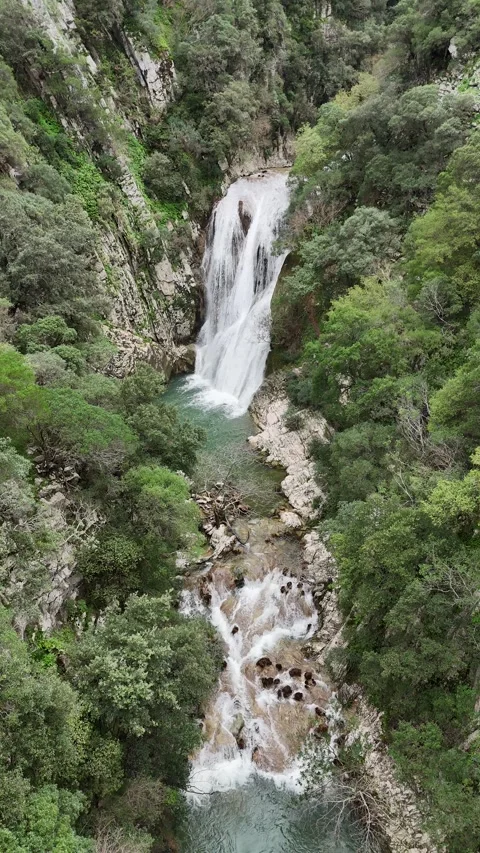 Aerial view vertical of Polylimnio Waterfall in Messinia, Greece after heavy rai 스톡 동영상 303188945