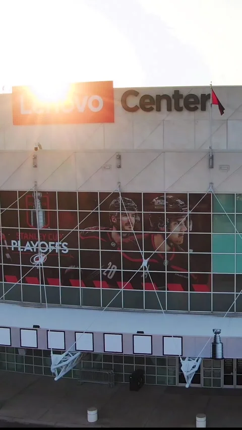 Aerial View Vertical Tracking Shot of Lenovo Center Arena Entrance in Raleigh NC Stock Footage 335549680