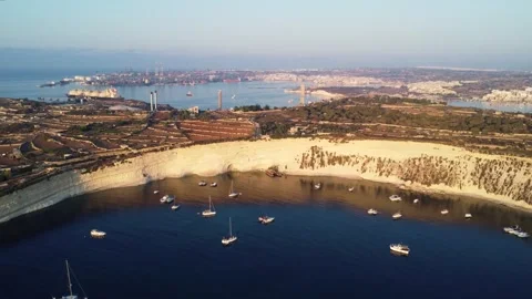 Aerial view of vertical white limestone cliffs rising above the blue Medite.. Stock Footage 325801955