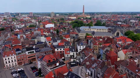Aerial view video clip of the dense red roofed cityscape of Ghent in Belgium Stock Footage 341461492