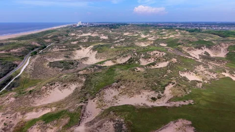 Aerial view video clip of Katwijk aan Zee coastal sand dunes landscape Stockbeeldmateriaal 341974593