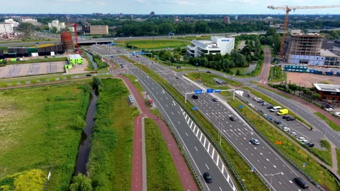 Aerial view video clip of multi-lane highway overpass bridge with vehicle Stock Footage 342411382
