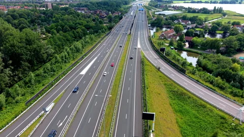 Aerial view video clip of multi-lane highway expressway, traffic driving Stock Footage 342412650