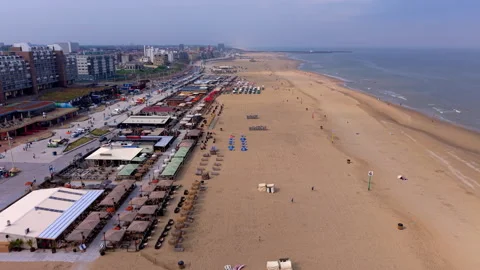 Aerial view video clip of Scheveningen sandy beach, beachfront restaurants Stock Footage 341680955