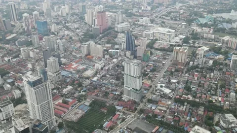 Aerial view of view fields, buildings, offices and apartments in Kuala Lumpur Stock Footage 150291149