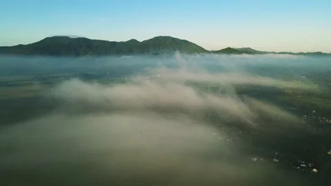 Aerial view, a view of the sea of ??mist that covers the village and rice fie Stock Footage 188395437
