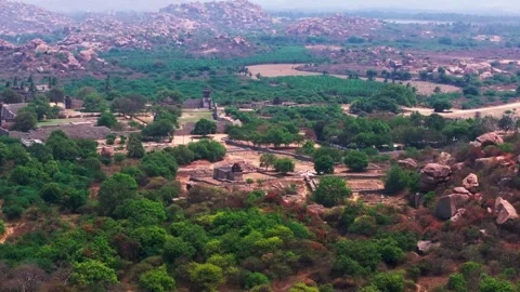 Aerial view of vijayanagara empire with mountains and greenery at hampi Stock-Footage 333332244