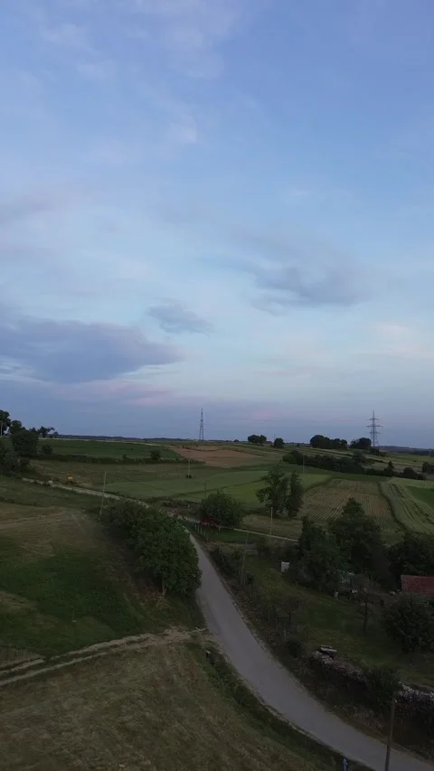 Aerial View of Village With Fields and Country Road 動画素材 337023697