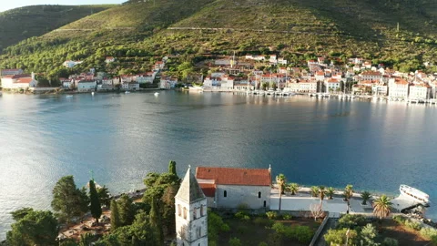 Aerial view of Vis town at sunset on Vis island, Croatia. Video stock 148209944