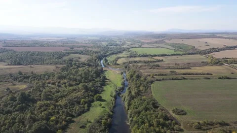 Aerial view of Vit river, passing near village of Aglen, Bulgaria Stock Footage 234984830