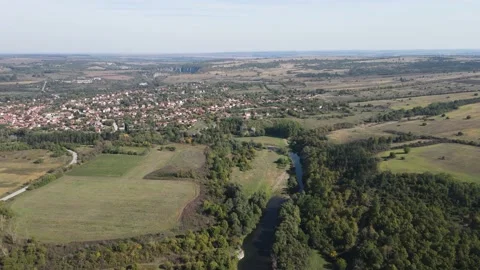 Aerial view of Vit river, passing near village of Aglen, Bulgaria 動画素材 234984928