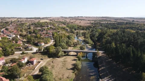 Aerial view of Vit river, passing near village of Aglen, Bulgaria Stock Footage 277024921