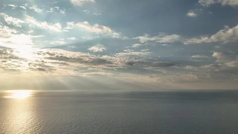 Aerial View: A vivid sunset transforms the Mediterranean sky into a dramatic Stock Footage 296031058