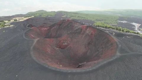 Aerial View of a Volcanic Crater Surrounded by Forest Stock Footage 345576399