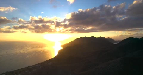 Aerial View of Volcanic Mountain Range in Magdalena Bay Mexico at Sunrise Stock Footage 334638628
