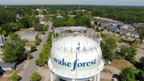 Aerial View of Wake Forest NC Water Tower Top and Town Canopy Stock Footage 346563972