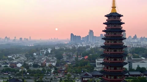 Aerial view of wanfo old tower in midtown of jinhua at sunset Stock Footage 196899179